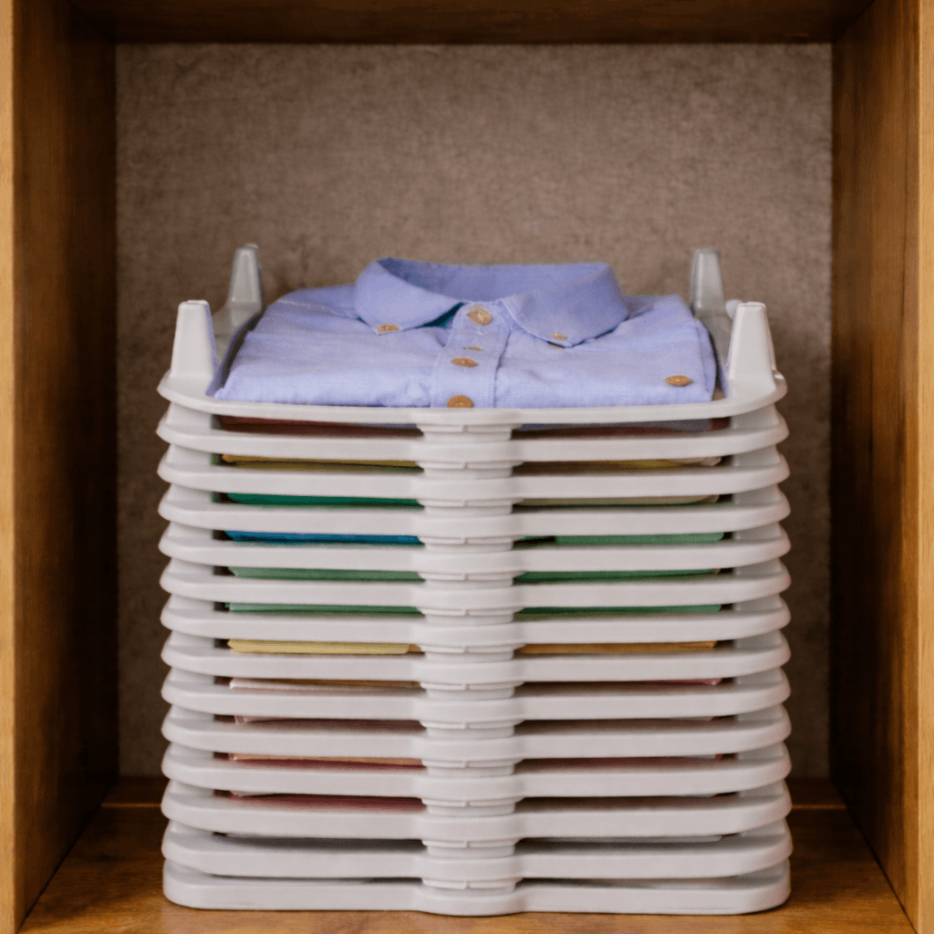 Organized wardrobe shelf with StackSmart storage
